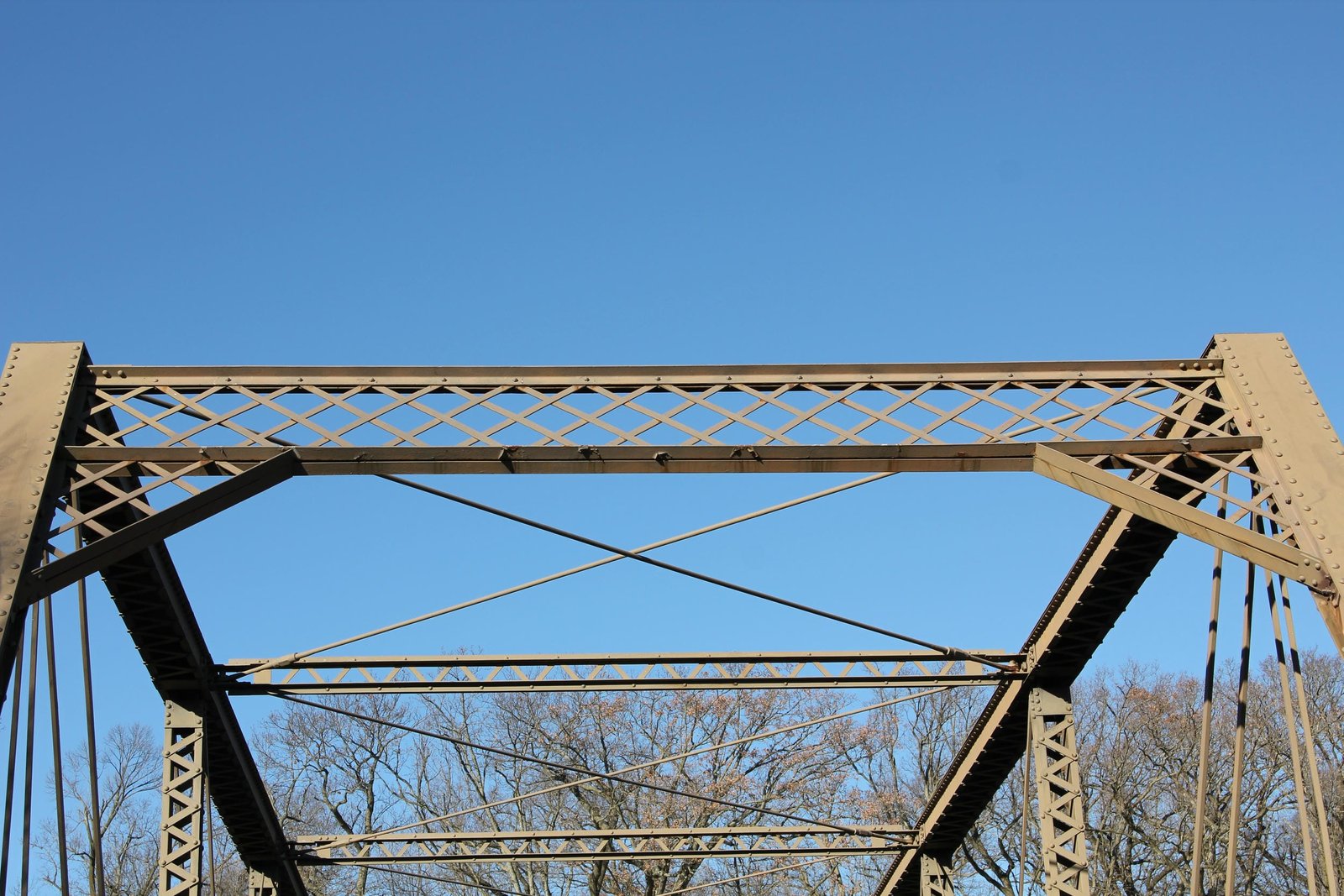 Portal bracing, through truss span